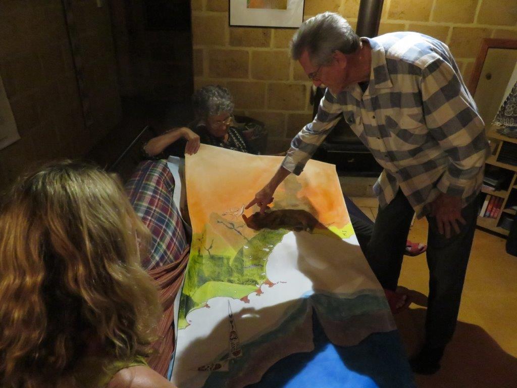 ken and lynne explaining panel 3 of the canvas